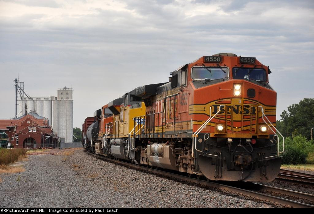 Manifest cruises east past the station